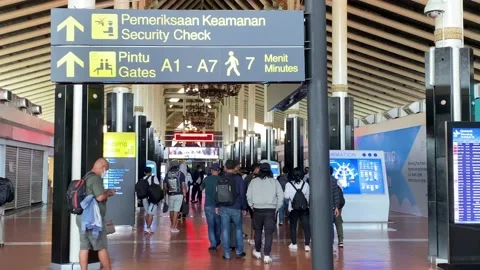 CORRIDOR INSIDE THE BALI AIRPORT Video stock 239415261