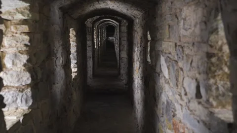 A corridor inside the defensive wall of the medieval Kamianets-Podilskyi Castle Stock Footage 295355014
