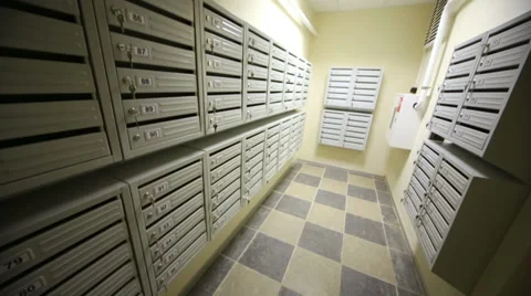 Corridor with letter boxes on walls in new residential building. Stock Footage 39401243