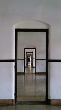 Corridor with multiple black-framed doorways Stock Photos