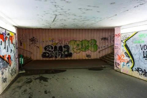 Corridor sprayed with graffiti Stock Photos