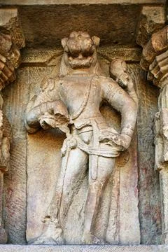 Corridor statue in Durga temple 7th century, Aihole, Karnataka, India Heritag Stock Photos