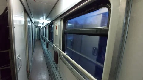 Corridor of a train car in motion in the evening Stock Footage 270117569