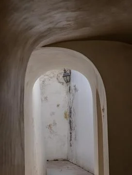 Corridor Under the Ancient building with cement wall. Stock Photos