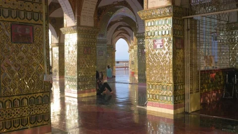 Corridors of a temple decorated with gold with its mosaics, in Myanmar Stock Footage 236733144