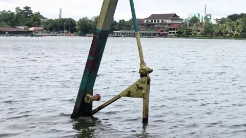 Corroded Steel Support Frame in an Urban Lake Stock Footage 339290565