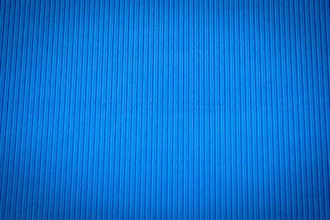 Corrugated application paper background. Blue color Stock Photos