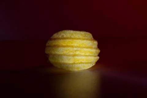 Corrugated chips in red light on a background Stock Photos