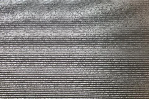 Corrugated horizontal surface texture for backdrop or background. Foto stock