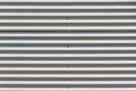 Corrugated iron sheet facade close up shot for use as texture Stock Photos