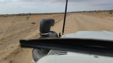 CORRUGATED ROAD TO THE DESERT Stock Footage 100725016