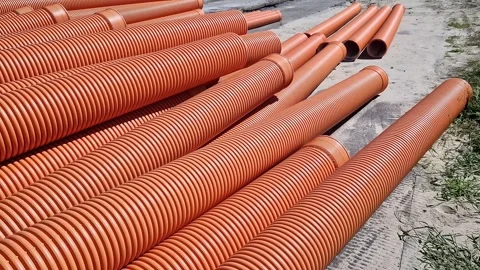 Corrugated sewer pipe, double-layer. Pipes stacked together, repair work Stock Footage 316260959