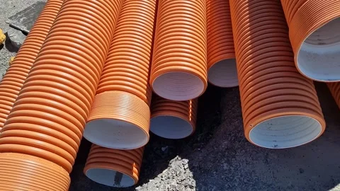 Corrugated sewer pipe, double-layer. Pipes stacked together Stock Footage 316261049