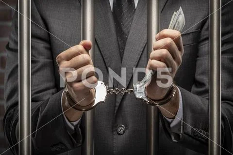 Corrupt man holding bills of money Stock Photos
