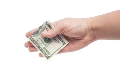 Corruption concept: hand giving bribe 100 USD Stock Photos