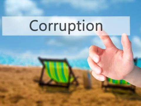 Corruption - Hand pressing a button on blurred background concept on visual s Stock Photos