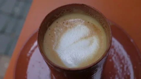 Cortado in a brown cup Stock Footage 239237164