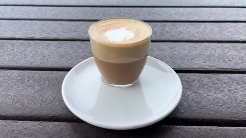 Cortado on a table Stock Footage 312492052