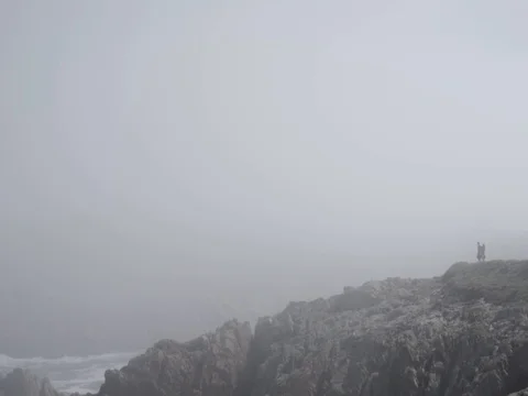 A Coruna cliff with hiking couple, flat  profile, fullHD Stock Footage 102658331