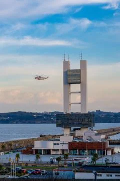 Coruña maritime control tower, called the H, is flown over by a maritime res Stock Photos