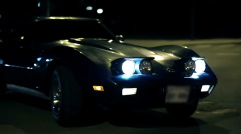 Corvette C3 driving through the city Stock Footage 33003339