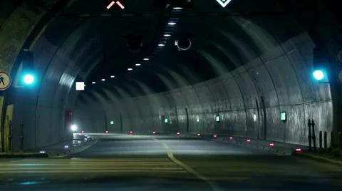 Corvette driving through the tunnel towards the camera Stock Footage 33003574