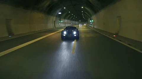 Corvette overtakes and passes by the camera in the night Video stock 33003762
