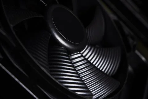 Cose up of computer fan on a dark background 스톡 사진