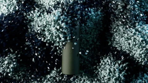 Cosmetic bottle emerging from rotating plastic polymer granules. Stock-Footage 328608920