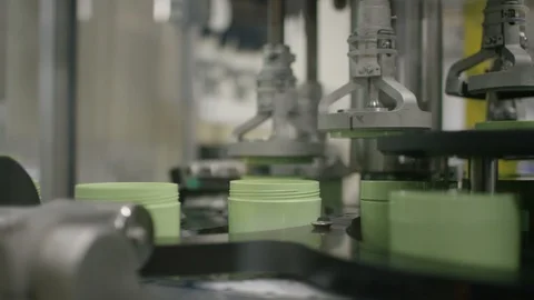 Cosmetic boxes being packed by machine on production line Stock Footage 107962373