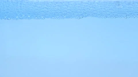 Cosmetic bubbles background. Macro shot of blue clear bubbles Stock Footage 275888792