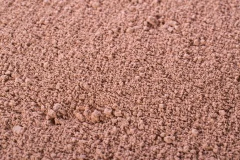 Cosmetic clay texture, background. Natural pink mask, dry clay Stock Photos