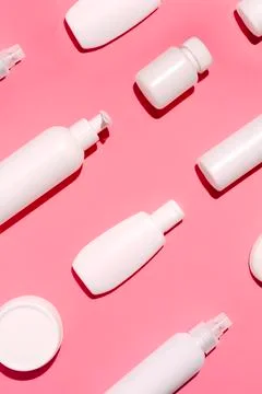 Cosmetic mock up pattern on pink background Stock Photos