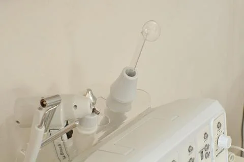 Cosmetic Multifunctional Device close-up in beauty salon. Stock Photos