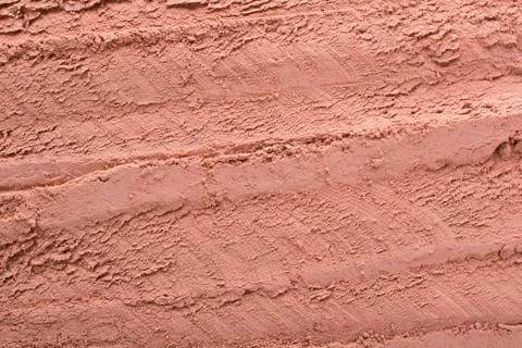 Cosmetic  red clay texture, background. Natural mask, dry clay Foto stock