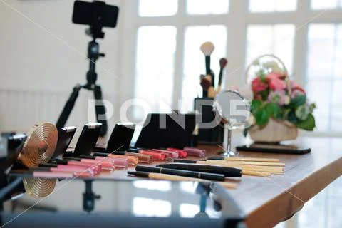 Cosmetic & smartphone for recording video on beauty blogger table Stock Photos