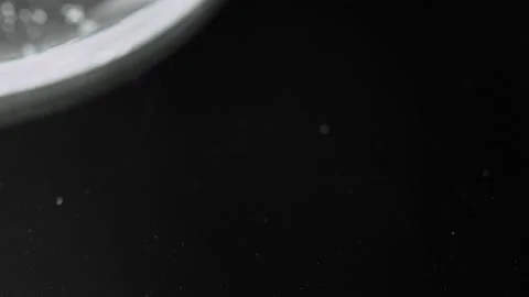 Cosmetic Transparent Liquid Gel With Tiny Bubbles On A Black Surface. - Stock Footage 140564662