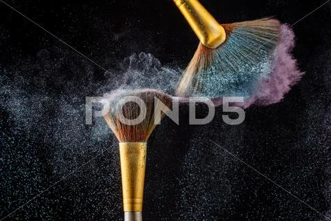 Cosmetical splash from the special brushes Stock Photos