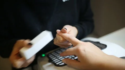Cosmetician using polishing block while doing manicure Stock Footage 86213517