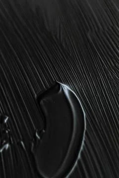 Cosmetics abstract texture background, black acrylic paint brush stroke, text Stock Photos