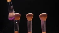 Cosmetics Brushes And Explosion Colorful Makeup Powder Stock Footage