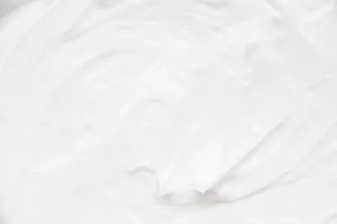 Cosmetics. Cream white background texture. Stock Photos