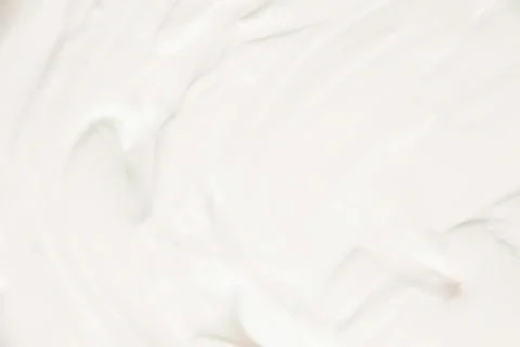 Cosmetics. Cream white background texture. Stock Photos