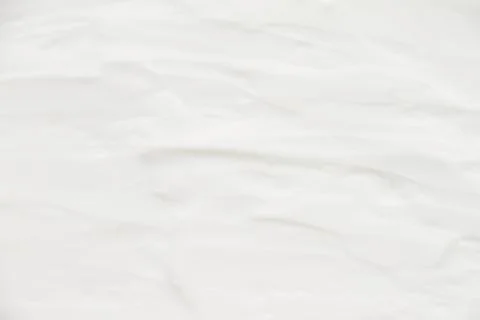 Cosmetics. Cream white background texture. Stock Photos