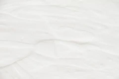 Cosmetics. Cream white background texture. Stock Photos