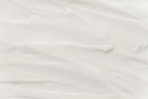 Cosmetics. Cream white background texture. Stock Photos
