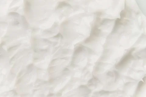 Cosmetics. Cream white background texture. Stock Photos