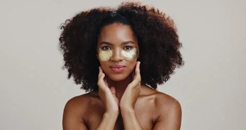 Cosmetics, eye patch with face of woman in studio for beauty, hydration and self Stock Footage 303651471