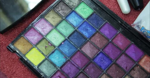 Cosmetics. Eyeshadows on table. Video stock 53082423