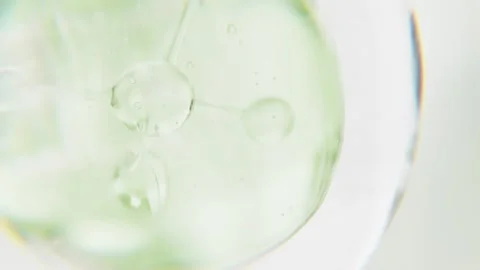 Cosmetics green serum liquid bubble 3d abstract background. Cosmetic moisturizer Video stock 337482155